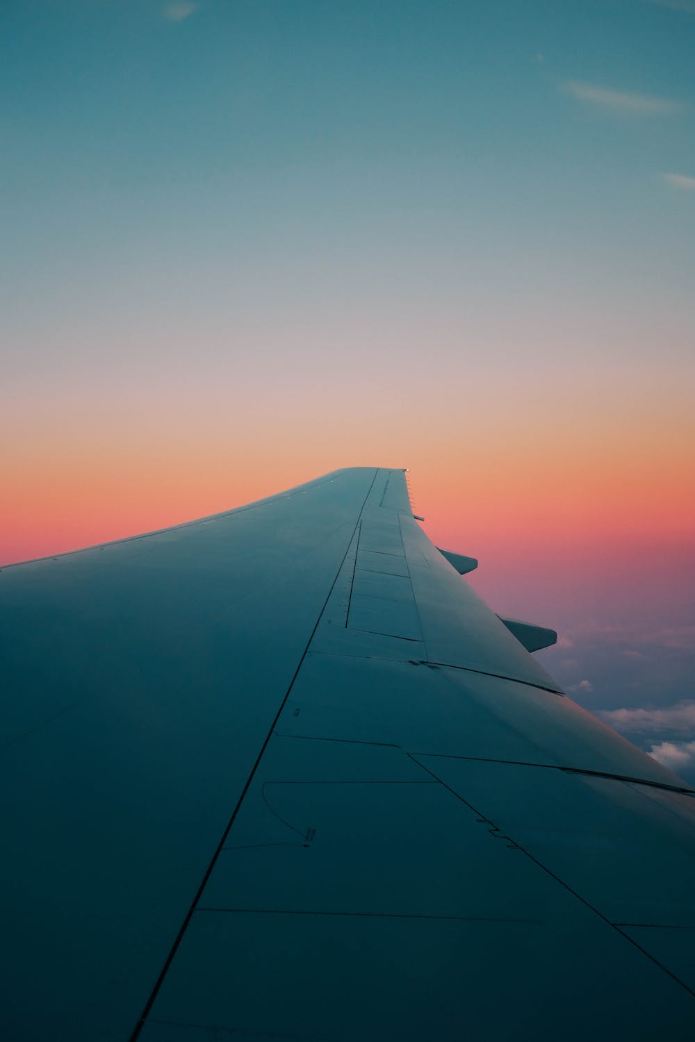 airplane wing at sunset